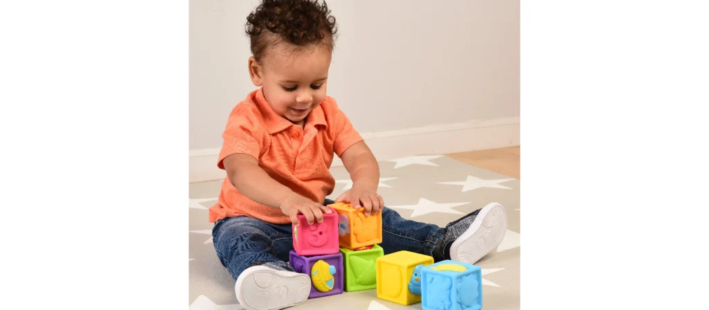 26 Best Preschool Educational Activities to Nurture Young Minds 17 Children playing with building blocks