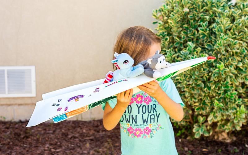 50 Rainy Day Activities for Kids That Inspire Indoor Fun 44 Create a Giant Paper Airplane