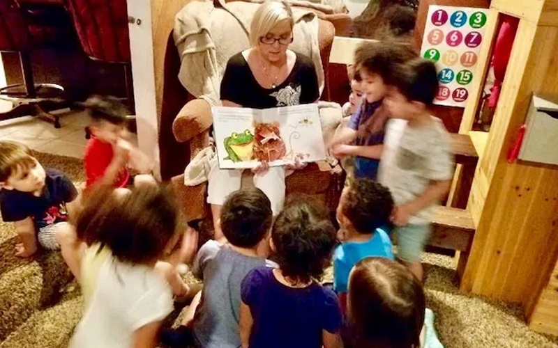 50 Rainy Day Activities for Kids That Inspire Indoor Fun 19 Reading Circle with Storytime Props