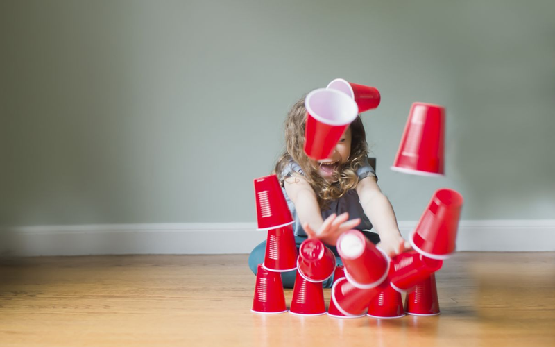 50 Rainy Day Activities for Kids That Inspire Indoor Fun 46 Stack Cups and Knock Them Down