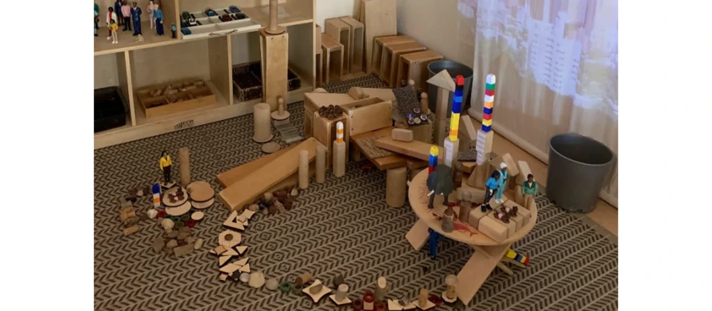 The children were playing with loose parts in the classroom